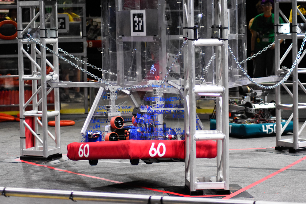 2024 robot scoring a ring into the goal